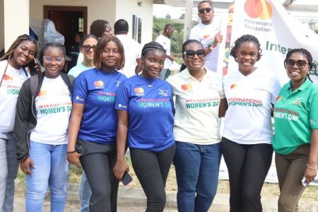 Agri-Impact, Mastercard Foundation marks IWD at Aglow Poultry Processing Factory