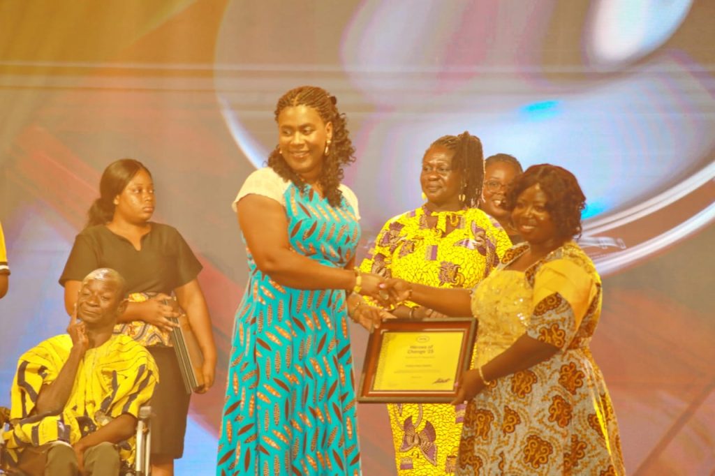 Sylvia Otuo Acheapong, Chief Products and Services Officer of MoMo (left), with Valeria Adzo Adzatia, founder of Smiles of Hope Organization