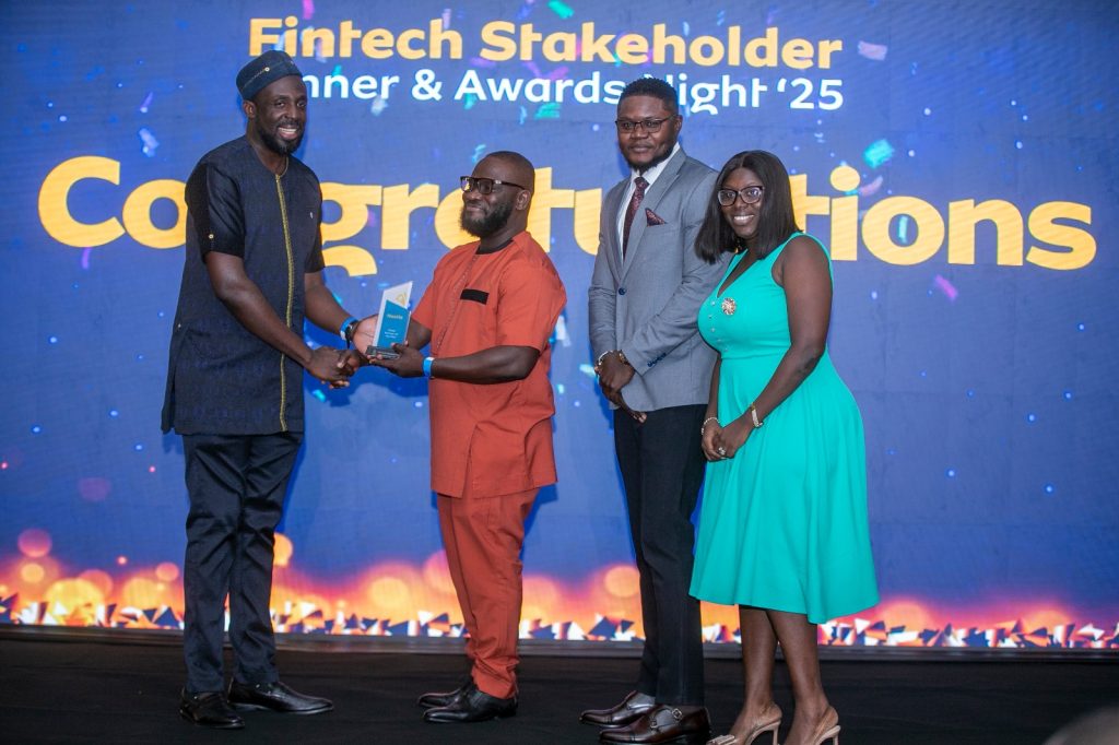 Chief Commercial & Operations Officer, Abdul Razak Issaka Ali present the FMCG partner of the year award to Nestle Ghana Limited